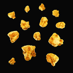 golden nuggets isolated on black