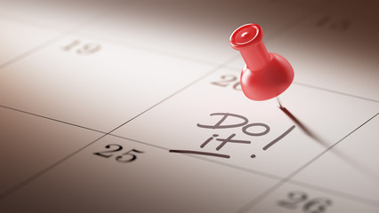 Wall Mural - Concept image of a Calendar with a red push pin. Closeup shot of