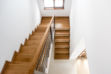 Interior Design. Wooden Minimalist Staircase In Luxury Home. Modern Architectural Loft With Wooden Steps