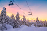 Fototapeta Krajobraz - Winter mountains panorama with ski slopes and ski lifts