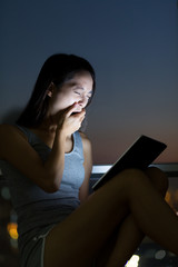 Canvas Print - Asian Young Woman feeling tired after using tablet