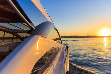 luxury motoryacht at sunset