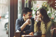© arthurhidden - Couple in love drinking coffee in coffee shop