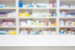 pharmacy counter with blur shelves of drug in the pharmacy drugs