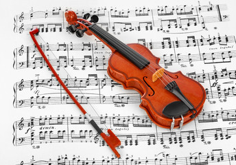 Toy violin and music sheet