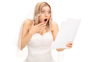 Poster - Shocked bride looking at a bill