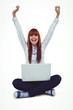 © WavebreakmediaMicro - Hipster woman with laptop and hands up