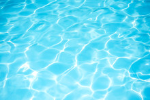 Bright Rippled Water In Swimming Pool