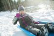 © Louis-Paul Photo - Lovely girl having fun on ancient sledge on winter snow day