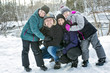 © Louis-Paul Photo - Happy parents and their kids in winterwear