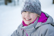 © Louis-Paul Photo - Little girl in winter season with hat in snow.