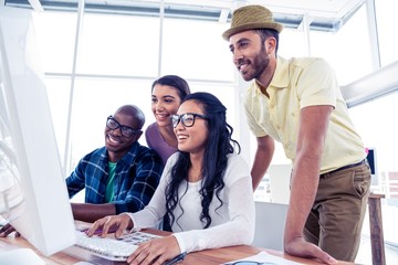 Wall Mural - Business team working over computer