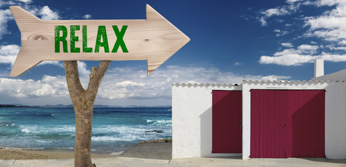 Wall Mural - wooden sign indicating to relax