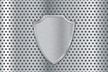 Metal shield on metal perforated background. 