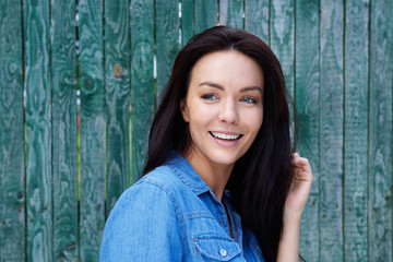 Wall Mural - Close up portrait of a smiling woman