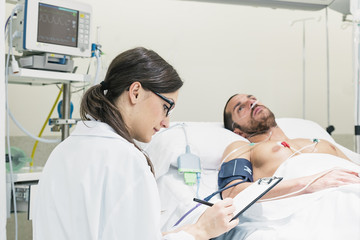 Doctor is caring a sick patient.