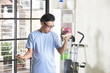 © wong yu liang - asian senior male with dumbell in the gym