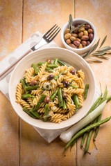 Wall Mural - pasta with green beans and black olives