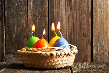 Canvas Print - Easter candles on wooden table