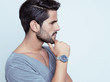 handsome young man with wrist watch