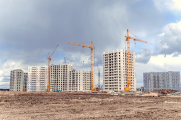 Tower cranes and construction work site