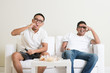 © WONG SZE FEI - Men watching tv together