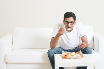 Wall Mural - Lonely man eating food