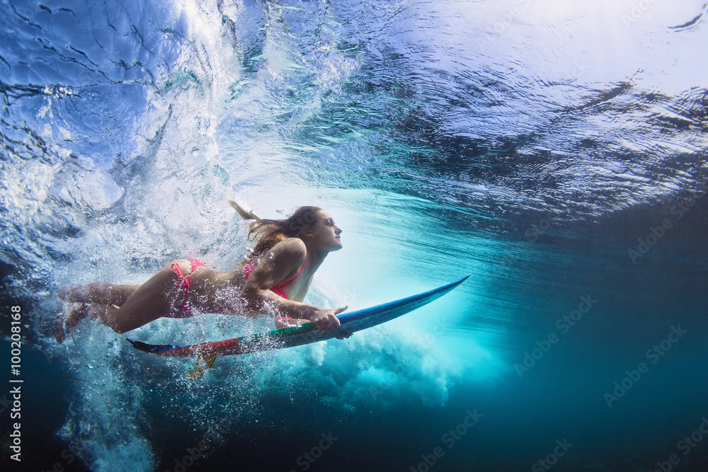 Young Girl In Bikini Surfer With Surf Board Dive Underwater With