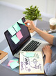 © lenetsnikolai - Young businesswoman working on a laptop