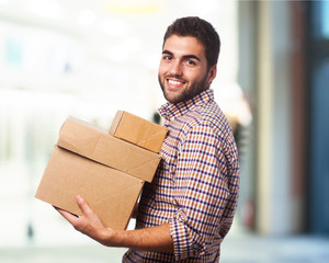 man holding boxes