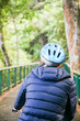 © twinsterphoto - Young man cycling in the forest trail in cold weather during weekend