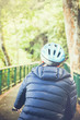 © twinsterphoto - Young man cycling in the forest trail in cold weather during weekend