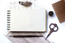 Mock-up For Presentations With Notebook Pen And Vintage Scissors. Desktop Workplace Designer Artist Painter Top View. Modern Trend Template For Advertising. Product Mockup.
