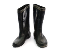 Dirty Black Rubber Boots Isolated On White Background