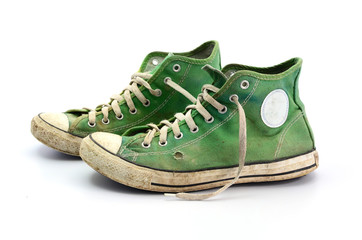 dirty sneakers isolated on a white background