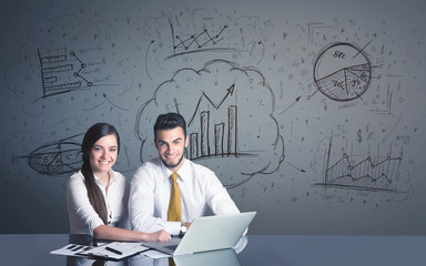 Wall Mural - business couple with business diagrams