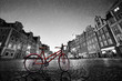 © Photocreo Bednarek - Vintage red bike on cobblestone historic old town in rain. Wroclaw, Poland.