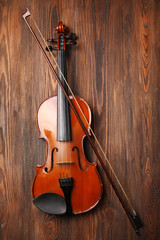 Wall Mural - Violin on wooden background