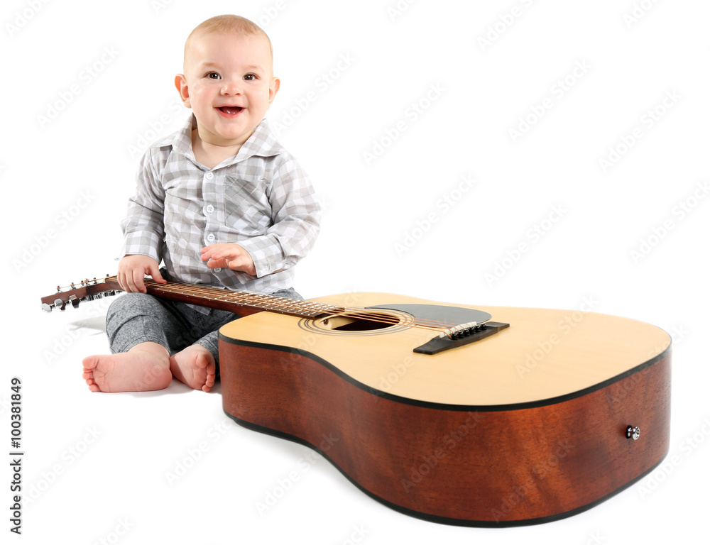 Cute baby with guitar isolated on white background, close up