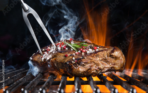 Beef steak on the grill. Canvas Print