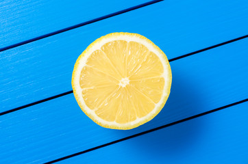 Sticker - Fresh lemon on blue wooden table