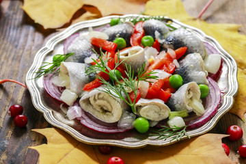 Wall Mural - Pickled herring rolls with vegetables