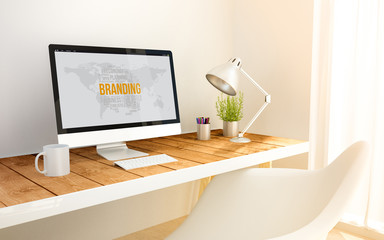Wall Mural - minimalist workplace with branding computer
