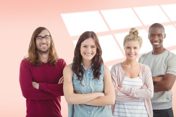 Smiling business team with arms crossed
