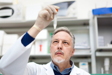 Poster - Researcher working in a laboratory