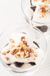 © skumer - Dessert with prune, walnuts and whipped cream