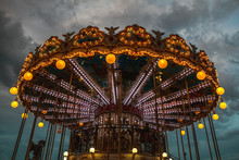 PARIS, FRANCE - AUGUST 30, 2015: Old French Carousel In A Holiday Park At Night Summer Time.