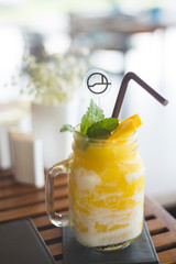 Wall Mural - fresh mango smoothie with mint leaf