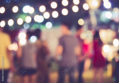Fotografie, Obraz Festival Event Party with People walking Blurred Background