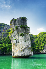 Sticker - Scenic rock pillar and azure water in the Ha Long Bay, Vietnam